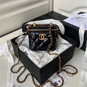 CHANEL Black and Gold Mini Quilted Bag